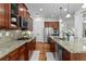 Spacious kitchen features granite countertops, stainless appliances, and ample storage at 1771 Silvergrass Ln, Grayson, GA 30017