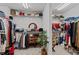 Organized walk-in closet with ample shelving and storage, providing plenty of space for clothes and accessories at 1771 Silvergrass Ln, Grayson, GA 30017