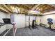 Basement featuring a home gym with a treadmill and weightlifting equipment at 180 Mountain Path, Rockmart, GA 30153