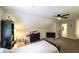 Bedroom featuring carpet, a black ceiling fan, a dresser, and a TV at 180 Mountain Path, Rockmart, GA 30153