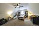 Bedroom featuring carpet, ceiling fan, a window, desk, bookshelves, and dresser at 180 Mountain Path, Rockmart, GA 30153