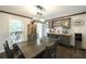 Dining room with hardwood floors, chandelier, and built-in bar area at 180 Mountain Path, Rockmart, GA 30153
