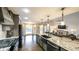 Kitchen featuring stainless steel appliances, a large island, and an open view to the living room at 180 Mountain Path, Rockmart, GA 30153