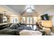 Open-concept living area showcasing hardwood floors, vaulted ceiling, and access to outdoor patio at 180 Mountain Path, Rockmart, GA 30153