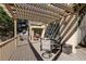 Covered porch with chairs offers a relaxing outdoor space and plenty of shade at 2006 Hubbard Ct, Villa Rica, GA 30180