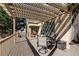 Covered porch with chairs offers a relaxing outdoor space and plenty of shade at 2006 Hubbard Ct, Villa Rica, GA 30180