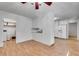 Spacious eat-in kitchen area with white cabinetry and appliances at 235 Trailmore Ct, Roswell, GA 30076