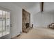 Spacious living room with stone fireplace and natural light at 235 Trailmore Ct, Roswell, GA 30076