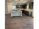 Modern kitchen with stainless steel appliances, granite countertops, and a spacious center island at 3030 Fairway Dr, Villa Rica, GA 30180
