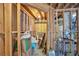 Unfinished basement with utilities, wiring, and exposed insulation, offering customization potential at 201 Beacon Cv, Canton, GA 30114