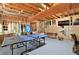 Partially finished basement with an unfinished area; includes a ping pong table and storage at 201 Beacon Cv, Canton, GA 30114