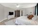 Relaxing bedroom featuring a spacious layout, plush rug, and soothing neutral tones throughout at 201 Beacon Cv, Canton, GA 30114