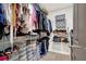 Walk-in closet features wire shelves and plenty of storage space for clothes and accessories at 201 Beacon Cv, Canton, GA 30114