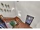 Entry featuring hardwood floors, a decorative door, and a staircase with wooden railings at 201 Beacon Cv, Canton, GA 30114