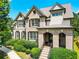 Beautiful two-story home featuring brick accents and a meticulously landscaped front yard at 201 Beacon Cv, Canton, GA 30114