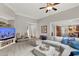 Spacious living room with comfortable seating, neutral decor, and open layout to the kitchen at 201 Beacon Cv, Canton, GA 30114