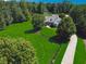 Aerial shot of the home and surrounding acreage at 206 Savanna Estates Ct, Canton, GA 30115