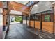 Inside the barn, showcasing wooden stalls with metal bars and good ventilation at 206 Savanna Estates Ct, Canton, GA 30115