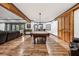 Spacious basement with hardwood floors, wet bar, pool table, and wooden support beams at 206 Savanna Estates Ct, Canton, GA 30115
