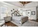 Spacious main bedroom featuring wood ceiling, bay windows, and hardwood flooring at 206 Savanna Estates Ct, Canton, GA 30115