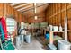 View of a storage shed containing hay bales and supplies at 206 Savanna Estates Ct, Canton, GA 30115