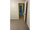 Bedroom with carpeted floors leads to the hallway at 3117 Reeves Se St, Smyrna, GA 30080