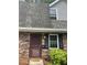 Charming brick townhouse featuring a well-maintained front entrance at 3117 Reeves Se St, Smyrna, GA 30080