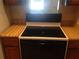 Close up of a kitchen featuring a black stove and wood countertops at 3117 Reeves Se St, Smyrna, GA 30080