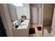 Bathroom featuring a single vanity, tiled floors, and bathtub at 5719 Singlebriar Ct, Norcross, GA 30093