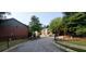 Street view of the community, showcasing well-maintained homes and landscaping at 5719 Singlebriar Ct, Norcross, GA 30093