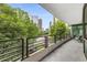 Spacious balcony with city views and outdoor seating, perfect for relaxing at 700 Park Regency Ne Pl # 703, Atlanta, GA 30326