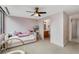 Bedroom with neutral colored walls, carpet floors, and large window view at 700 Park Regency Ne Pl # 703, Atlanta, GA 30326
