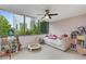 Bedroom with ceiling fan, carpet floors, large window view and natural light at 700 Park Regency Ne Pl # 703, Atlanta, GA 30326