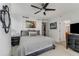 Bedroom with ceiling fan, art and a walk in closet at 700 Park Regency Ne Pl # 703, Atlanta, GA 30326