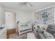 Bedroom with hardwood floors, neutral colors, and a patterned rug at 700 Park Regency Ne Pl # 703, Atlanta, GA 30326