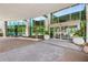 Grand entrance with floor-to-ceiling windows, sliding doors, brick paved area and potted plants for a welcoming ambiance at 700 Park Regency Ne Pl # 703, Atlanta, GA 30326