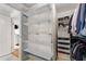 Organized closet with shelving and hanging space for clothes and accessories at 700 Park Regency Ne Pl # 703, Atlanta, GA 30326