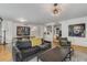 Spacious living room blending seamlessly with dining area, showcasing modern decor at 700 Park Regency Ne Pl # 703, Atlanta, GA 30326