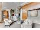 Stunning lobby with high ceilings, modern chandelier, comfortable seating, and sleek design elements at 700 Park Regency Ne Pl # 703, Atlanta, GA 30326