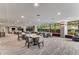 Inviting lounge area filled with natural light, featuring cozy seating arrangements, and picturesque outdoor views at 700 Park Regency Ne Pl # 703, Atlanta, GA 30326