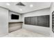 Efficient mail room with tidy mailboxes, modern lighting, and a convenient countertop for package handling at 700 Park Regency Ne Pl # 703, Atlanta, GA 30326