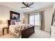 Bedroom with decorative wall art and large window at 164 Inwood Walk, Woodstock, GA 30188