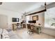 Bright home office with custom desks, modern lighting, and comfortable seating at 164 Inwood Walk, Woodstock, GA 30188