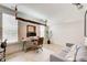 Spacious home office with custom desks, modern lighting, and comfortable seating at 164 Inwood Walk, Woodstock, GA 30188