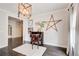 Bright office with decorative wood star, a rug, and a vintage desk at 164 Inwood Walk, Woodstock, GA 30188