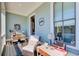 Relaxing porch with comfortable chair, decor, natural light and a view of the garden at 164 Inwood Walk, Woodstock, GA 30188