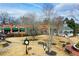 Scenic town green with walking paths, benches, a gazebo, and a clock tower at 164 Inwood Walk, Woodstock, GA 30188