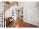 Welcoming foyer featuring hardwood floors, a staircase, and access to other rooms in the house at 1800 Hunters Moon Dr, Alpharetta, GA 30005