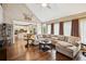 Open-concept living room flows into the kitchen and breakfast nook, perfect for entertaining at 1800 Hunters Moon Dr, Alpharetta, GA 30005