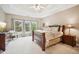 Spacious bedroom with large windows, trey ceilings, and neutral tones at 1800 Hunters Moon Dr, Alpharetta, GA 30005